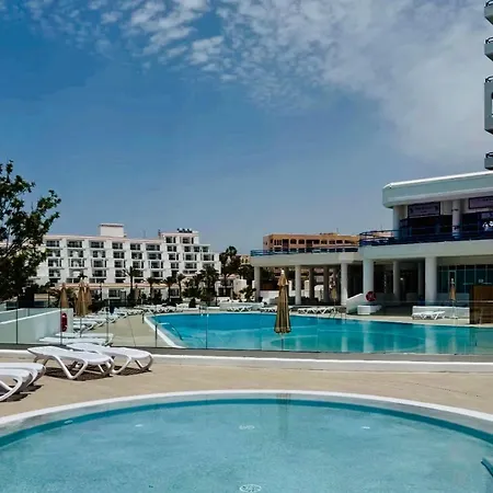 Апартаменты Sunrise In Paradise Адехе